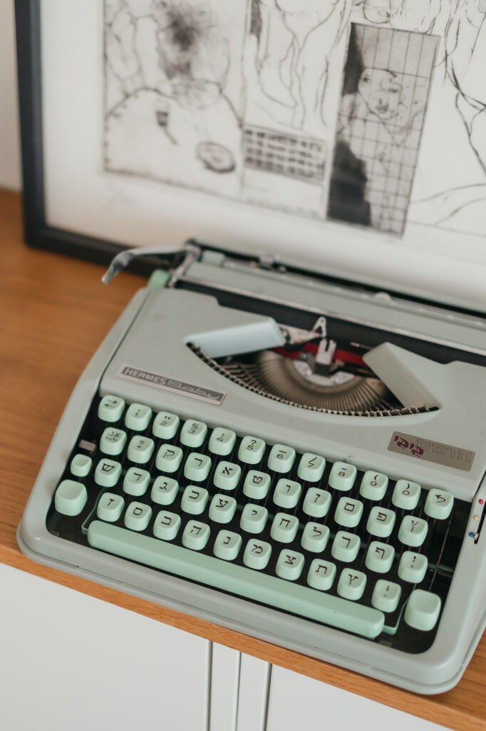 Vintage typewriter on shelf